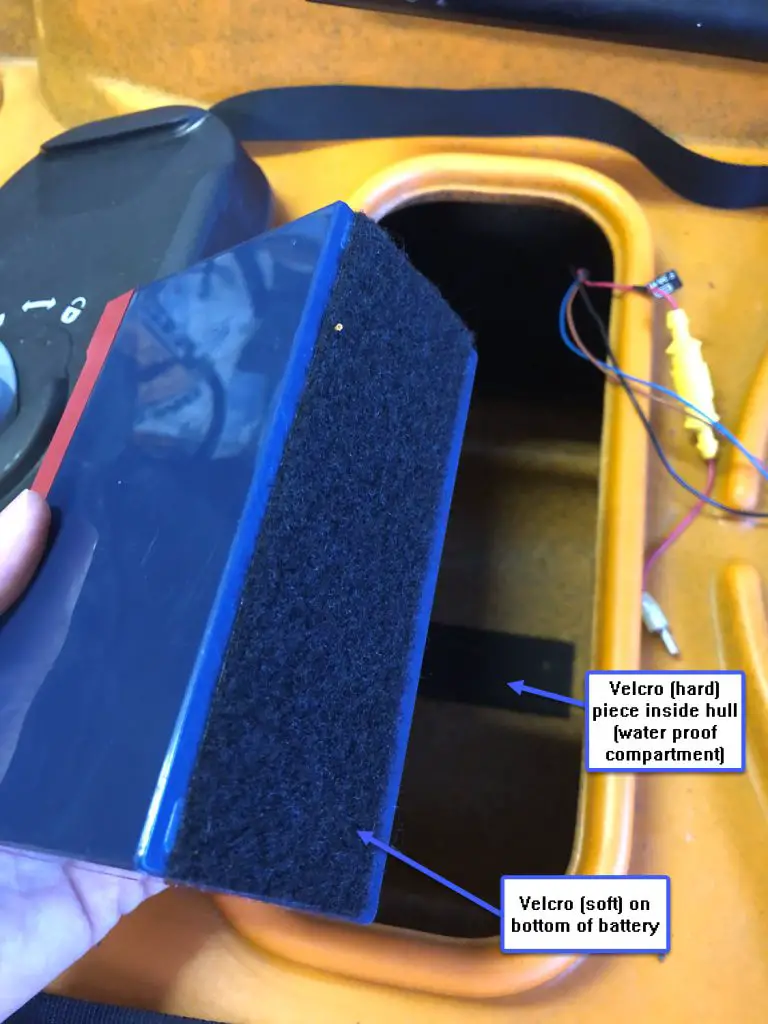 Velcro on battery to connect inside hull